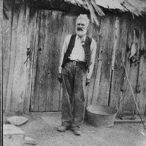 Old man outside slab hut (copy for Mr Dowman)