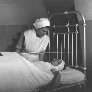 Nurse attending the patient Harry Lewis, speedway drive...