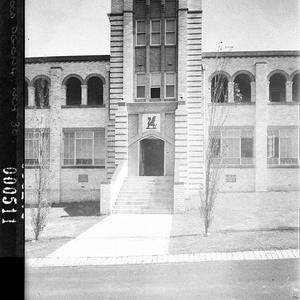 Sectional view of entrance; showing the school crest, N...