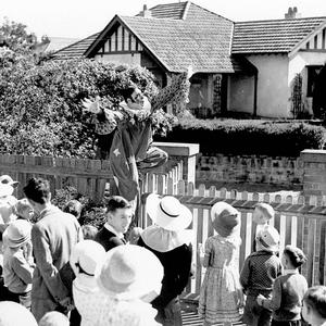 Norman Wright, clown, amuses the crowd at the Rose Bay ...