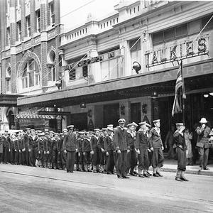 Navy League cadets marching into the Mayfair Theatre