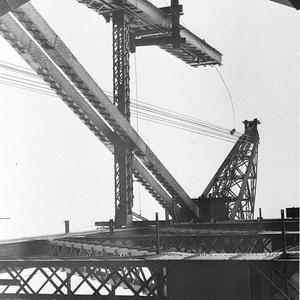 Creeper-crane on the south side lifting a large girder....
