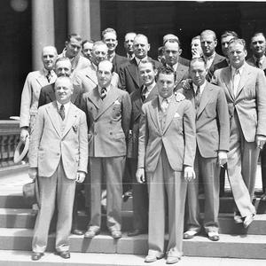 Group of golf players on the steps (for civic reception...
