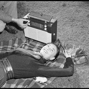 File 197: AWA portable radio with modelling by Norma Reed and Buck Braynard, ca. 1949 / photographed by Max Dupain