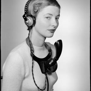 File 224: Pam Clemson modelling AWA headset in studio, ca. 1950 / photographed by Max Dupain