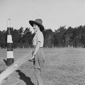 Young woman talking to the umpire