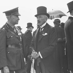 Former Prime Minister 'Billy' Hughes enjoys a joke with...