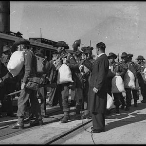 A.B.C. recording soldiers of the 2/4th Infantry off to ...