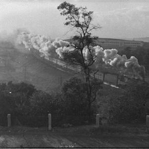 Smog over Newcastle. Railway through Adamstown with Lus...