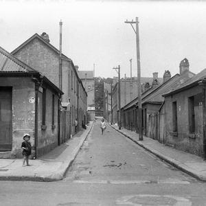 Slums of Sydney; a small child and a little girl in for...