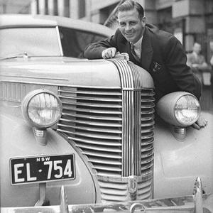 Opperman with Pontiac car (taken for L.V. Bartlett)