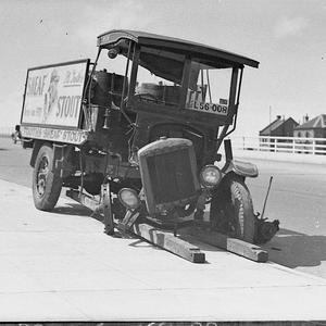 A wrecked Tooth's Brewery truck with Sheaf Stout advert...