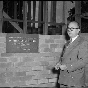 Mr R Glover beside foundation stone of Kotara Methodist...
