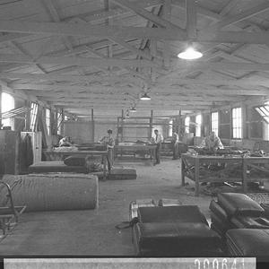 Interior of the bodyworks, showing sheet-metalwork shop