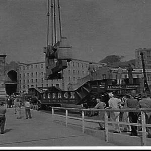 120 ton steel casting being loaded onto a Lennox transport 106 wheel road trailer truck by a Titan crane at Walsh Bay