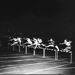Shirley Strickland of Australia clears the last hurdle ...