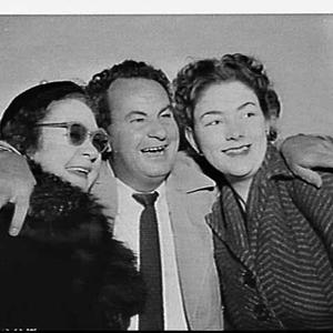 Leo McKern, Australian actor, and two women at Mascot A...