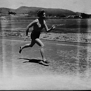Marjorie Jackson (the Lithgow Flash) running at a racec...
