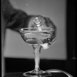 Champagne glass and bubbly, 20 October 1965 / photographs by Victor Johnston