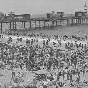 Coogee Beach and pier with summer crowd