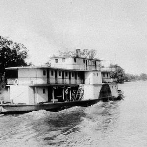 Passenger paddle steamer "Ruby" going downstream after ...