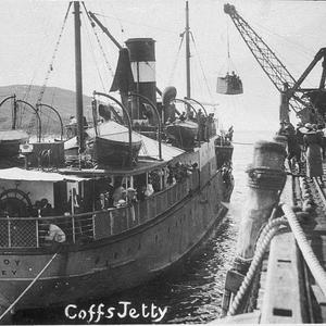 Coffs Harbour Jetty. Winching passengers ashore from th...