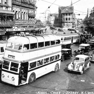 Kings Cross showing trolley bus, trams and cars - Sydne...