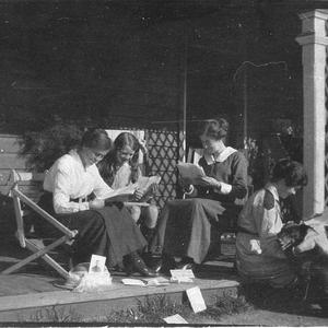 Reading mail on verandah at "Claris Park" - Trundle, NS...