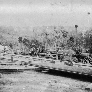 Railway construction. The placing of the last rail in p...