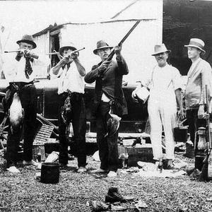 Shooting Party, note birds hanging from waist