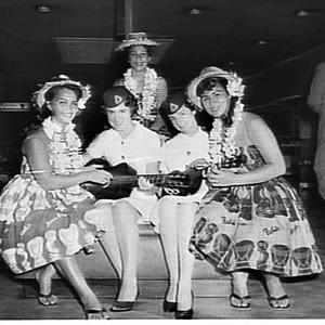 Tahitian dancers and TAA air hostesses, Mascot Airport