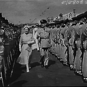 Elizabeth the Queen Mother inspects an RAAF guard-of-honour on arriving at Kingsford Smith Airport