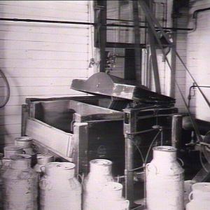 Interior butter factory showing churn, Raleigh