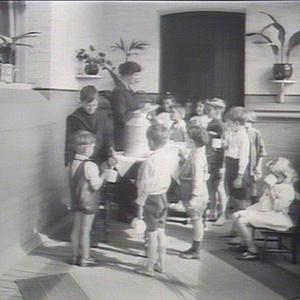 Blackfriars Infants School: children receiving their da...