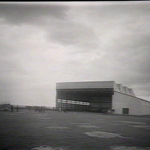 The hangar, machine running along ground after landing