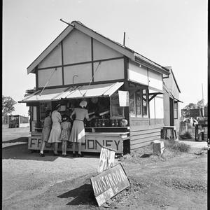 File 04: Roadside stall, [ca 1949] / photographed by Ma...