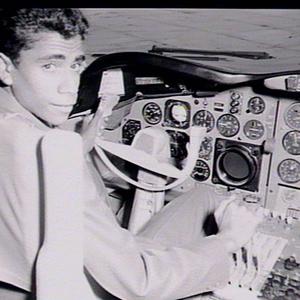Aboriginal boy, Desmond Williams, in cockpit of Lockhee...