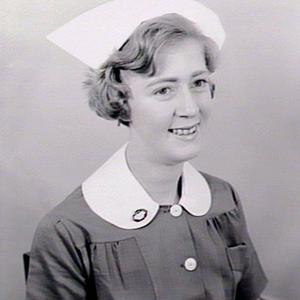 Office girl dressed as nurse for publicity purposes