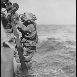 Testing deep sea diving suit, 5 April 1934