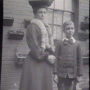 [Woman and boy dressed up]