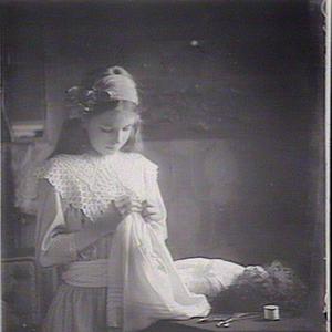 [Girl sewing, ca. 1910]