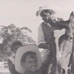 Aboriginal children horseriding, Smoky Dawson's ranch