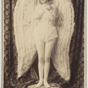 Miss Gertrude Powys as The Angel in the pantomime Sleep...