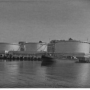 Oil tanks and boat refuelling lighter, Shell Oil Termin...