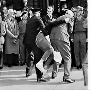 Governor-General Lord Casey reviews a march-past of tro...