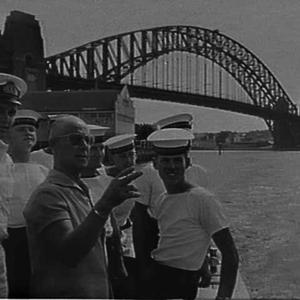 Jack Davey showing Sydney Harbour to crew of HMNZS Roto...
