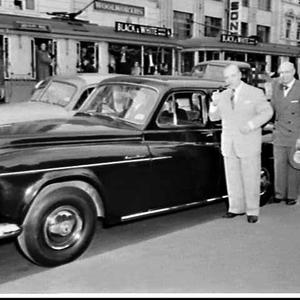 Pianist Jose Iturbi and chauffeur-driven Humber car, Sy...