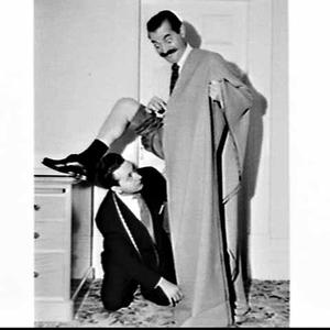 Jerry Colonna clowning with a tailor at Glen Ascham Pri...