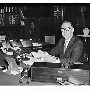 Premier Renshaw in his office