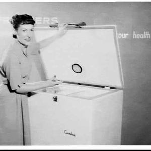 Personality Del Cartwright demonstrates a Crosley freez...